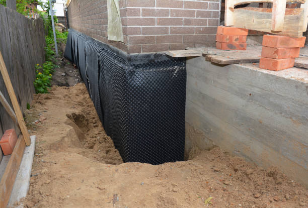 Happy homeowners after waterproofing job in Sadsburyville